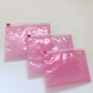 3 Glossier pink bags